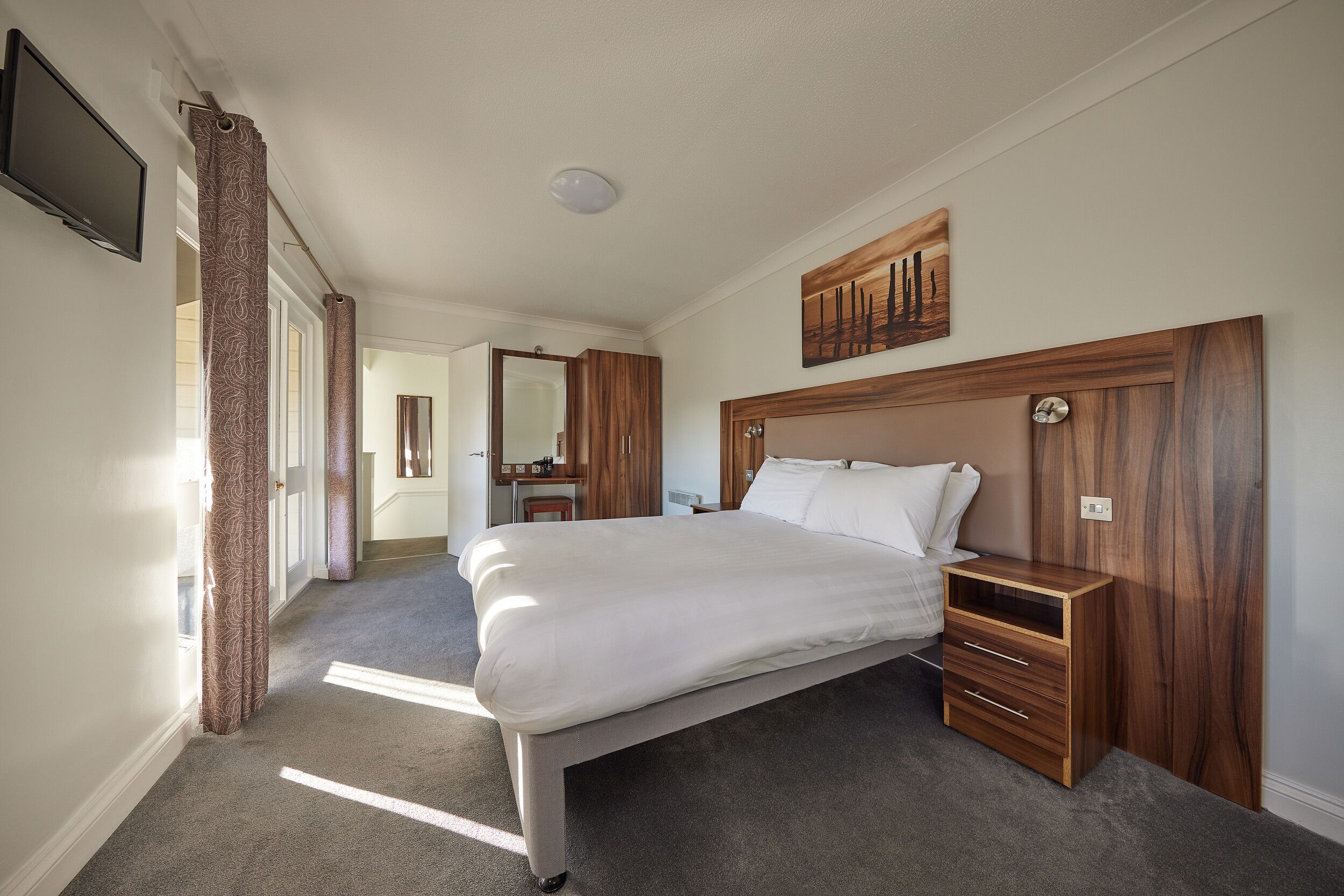 A double bedroom in our Deluxe Suites at Bognor Regis.