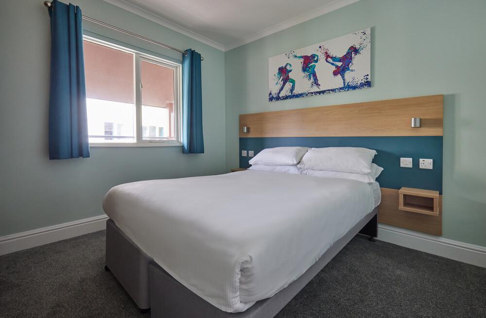 A double bedroom in our Comfort Plus Apartments at Minehead.