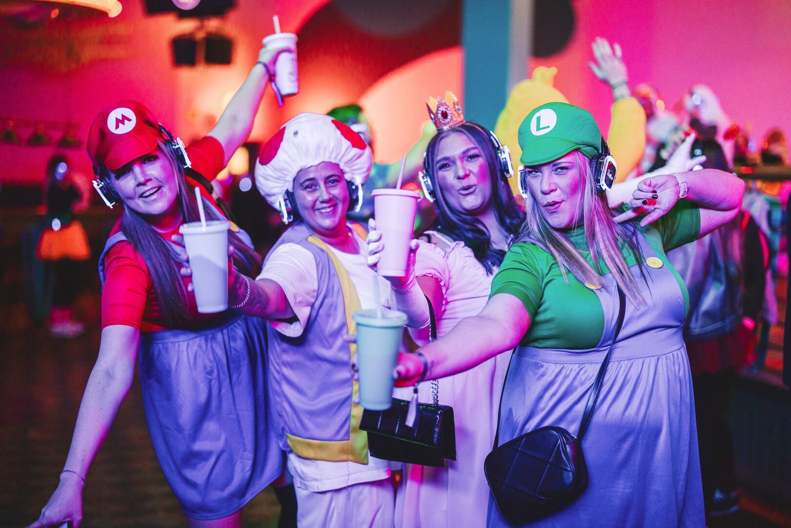 Four women in fancy dress for the Silent Disco Big Weekender activity.