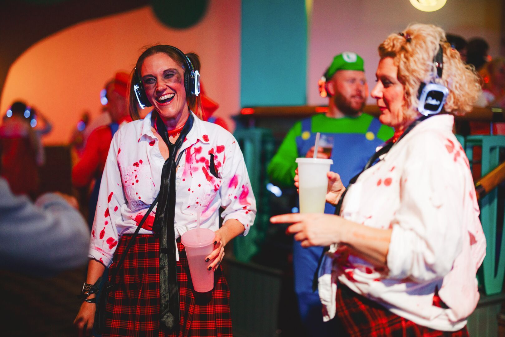 Two women in fancy dress for Creepy Silent Disco during a Halloweekender.