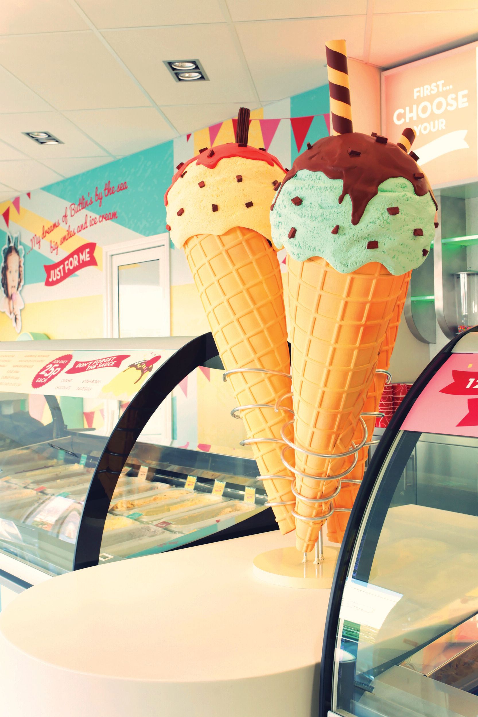 A giant ice cream decoration at the counter.