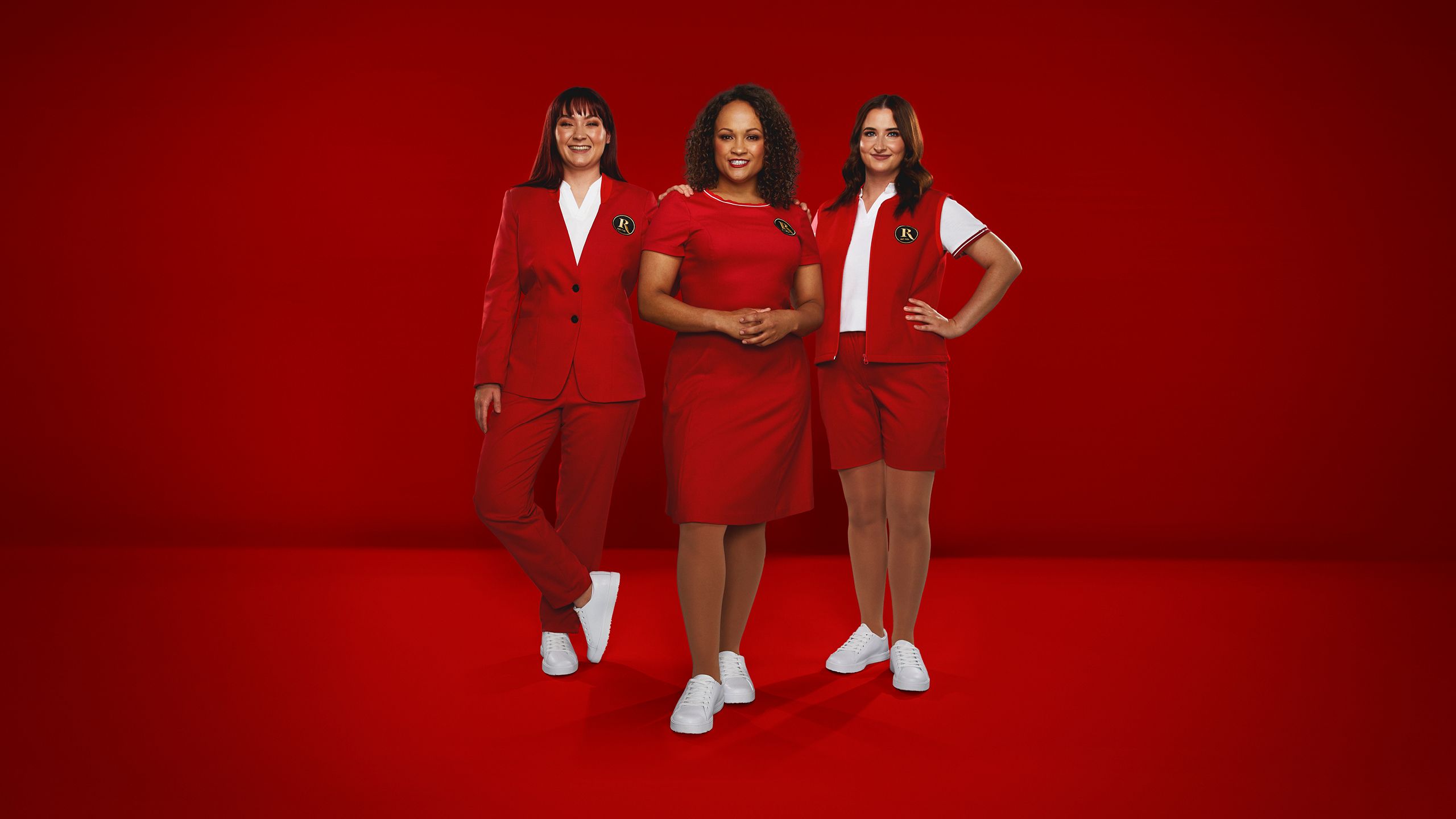 Three Redcoats pose for the camera.