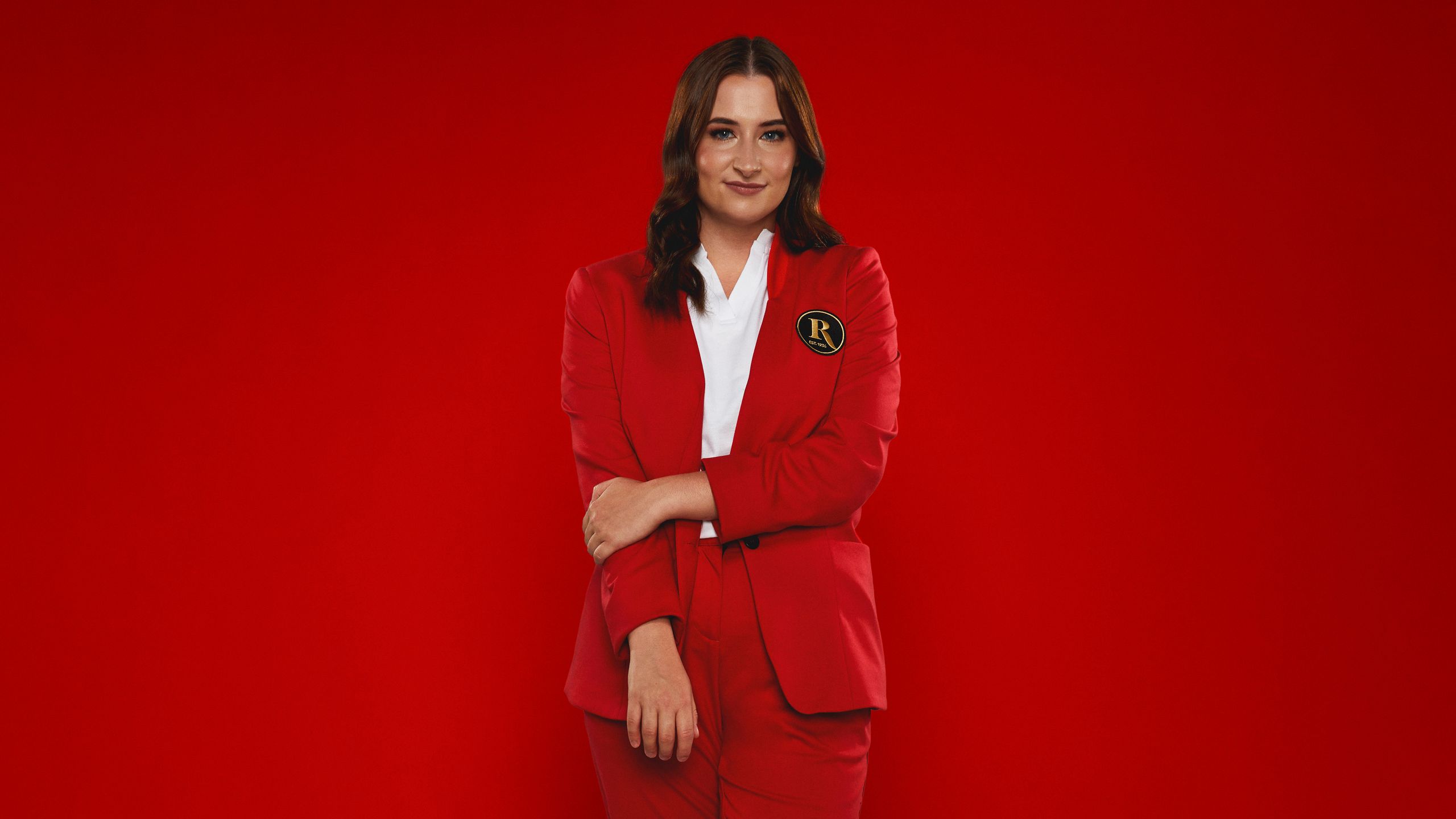 A Butlin's Redcoat poses for the camera.