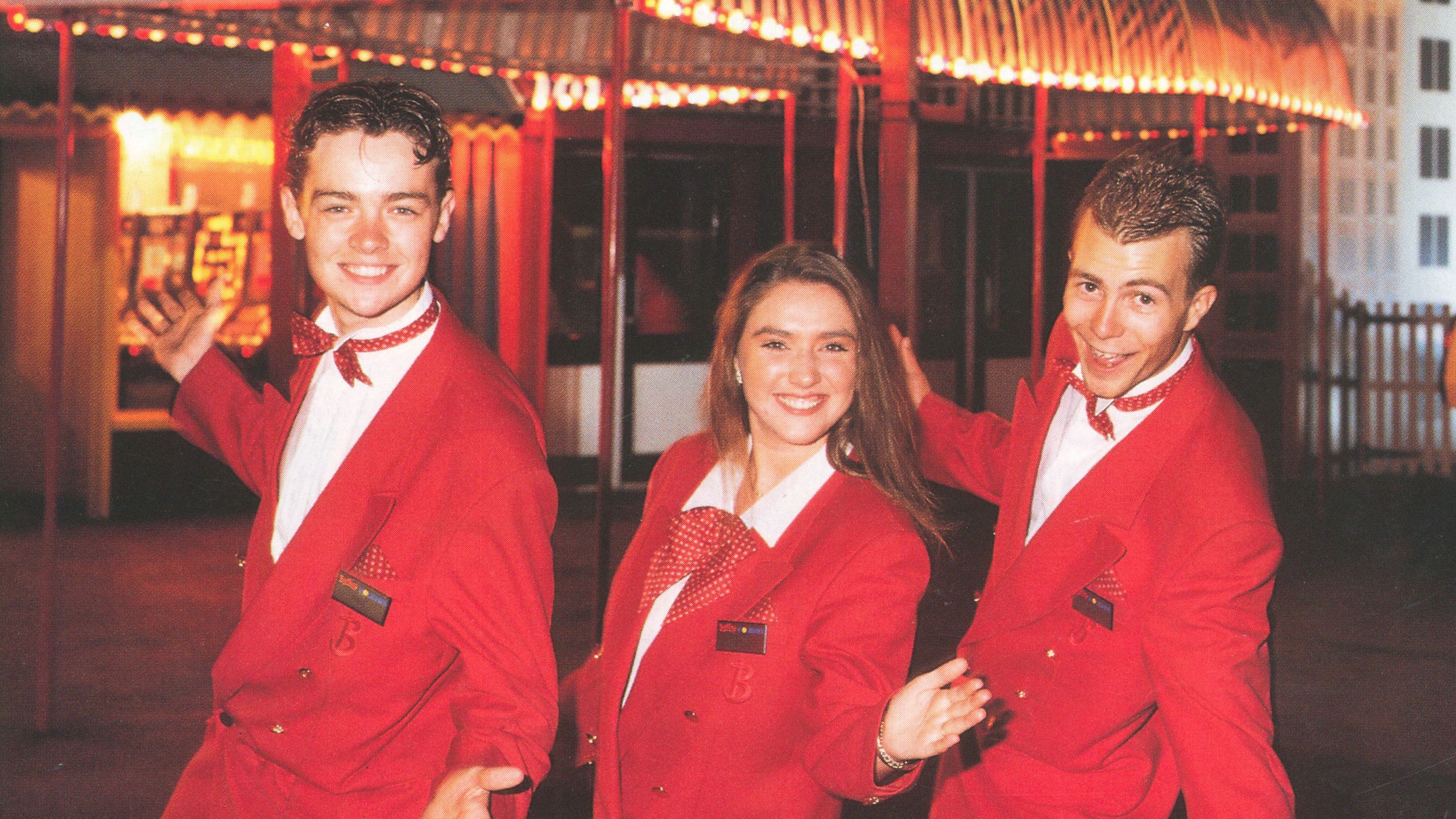 Three Redcoats pose for he camera, one of them being Stephen Mulhern.
