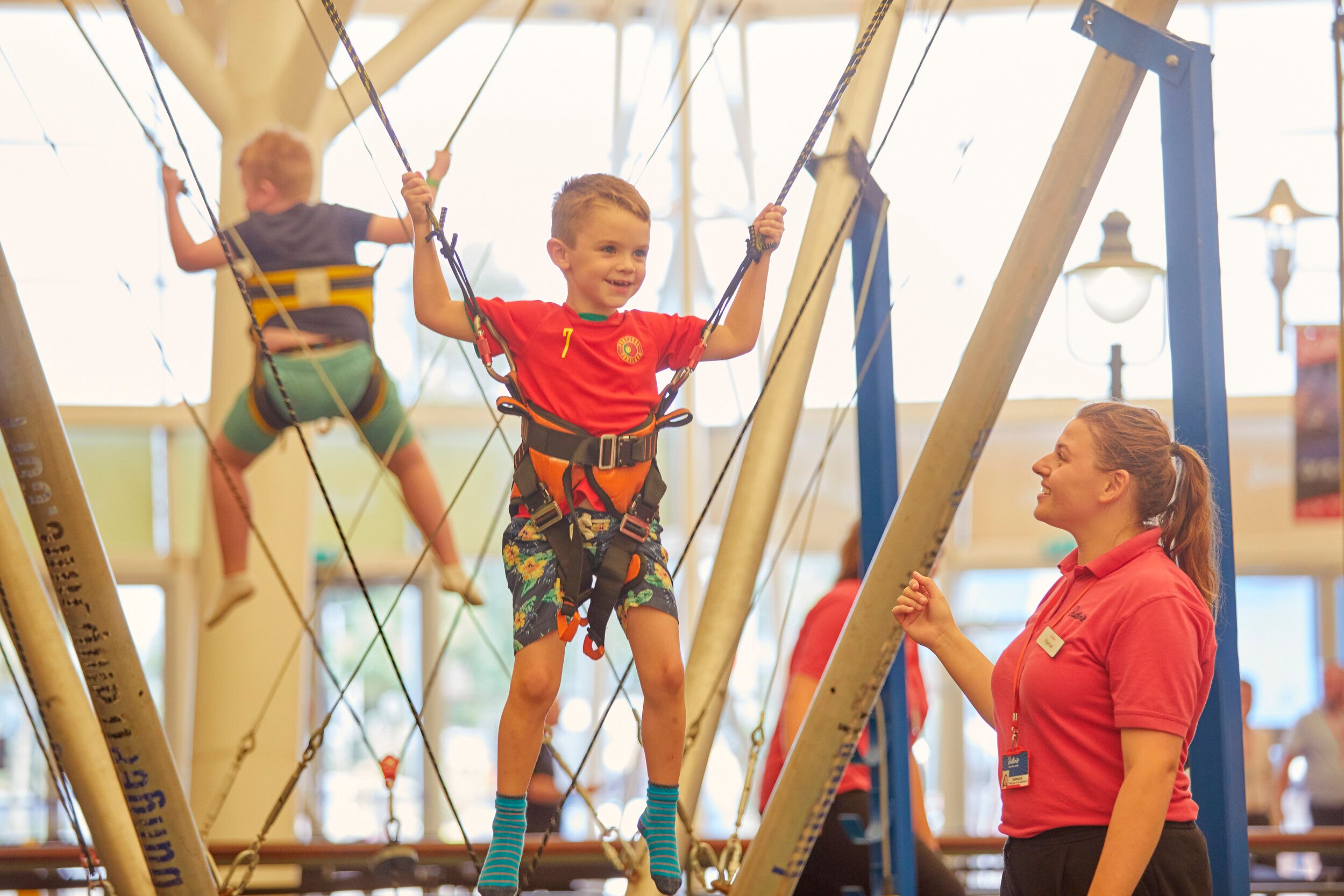 A boy preparing to jump on the trampoline.