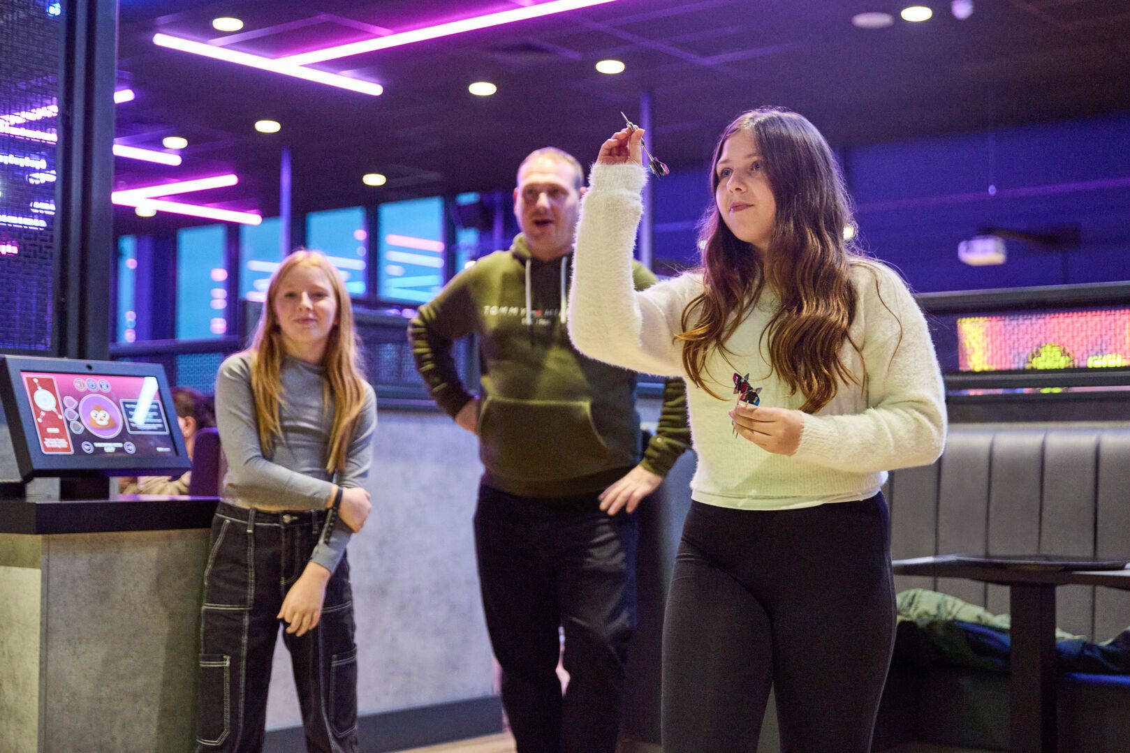 A family play Digi-Darts together at Playxperience in Bognor Regis.