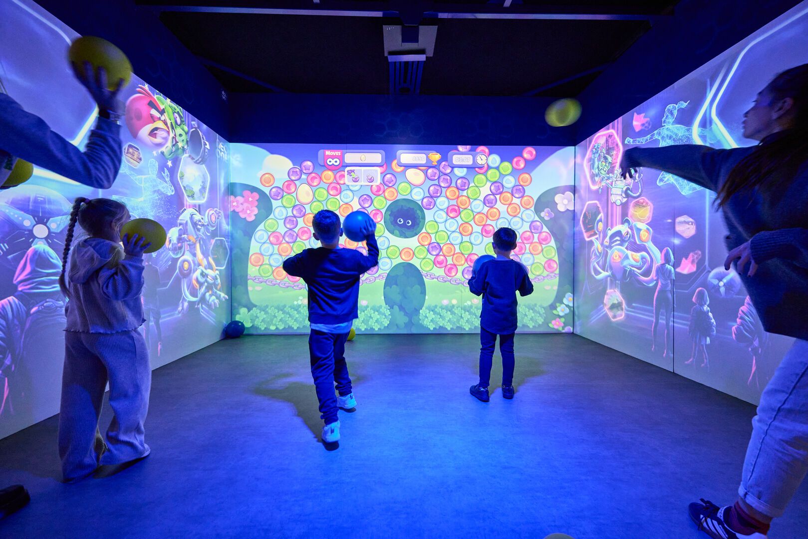 Some children play a game together at Neo Games in Playxperience.