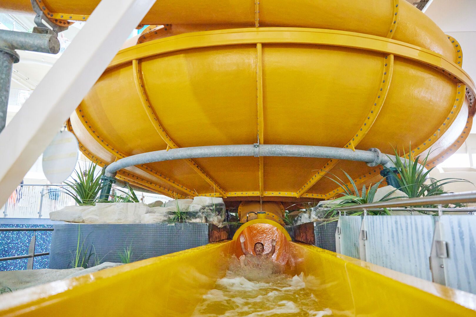 A large yellow slide at Skegness Splash Waterworlds.