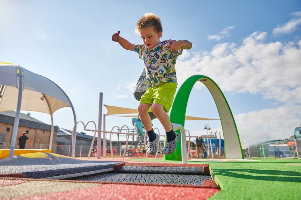 A young boy bounces on the trampolines at Butlin's Skypark.