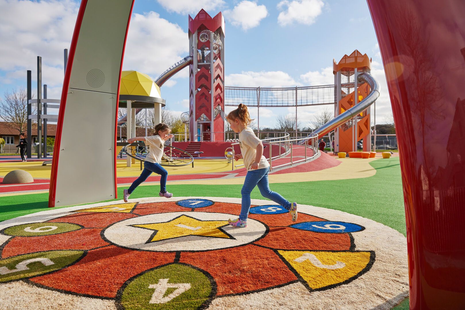 Two children playing together at the Butlin's Skypark in Skegness.