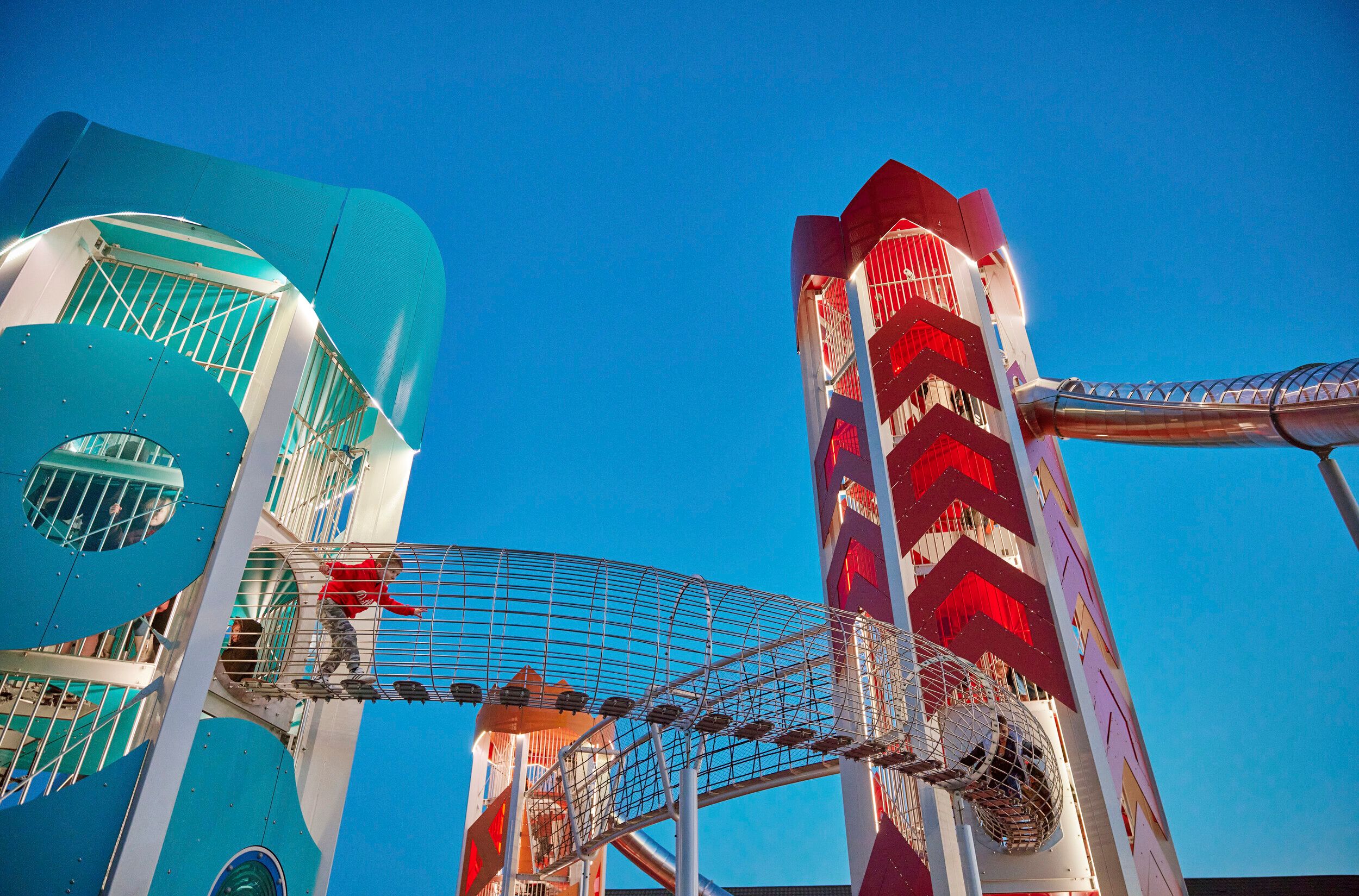 Three colourful tower slides in Skypark.