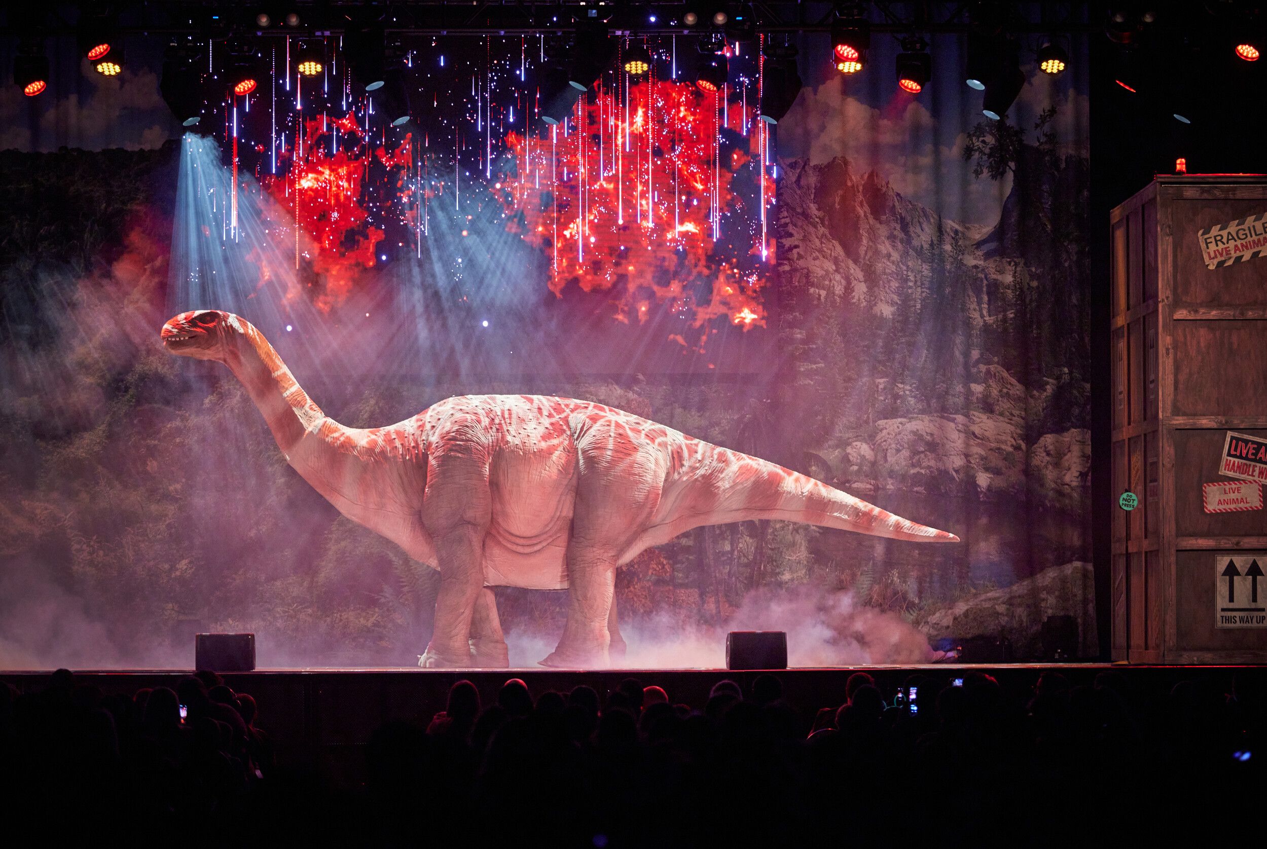 A life-size Brontosaurus on stage.