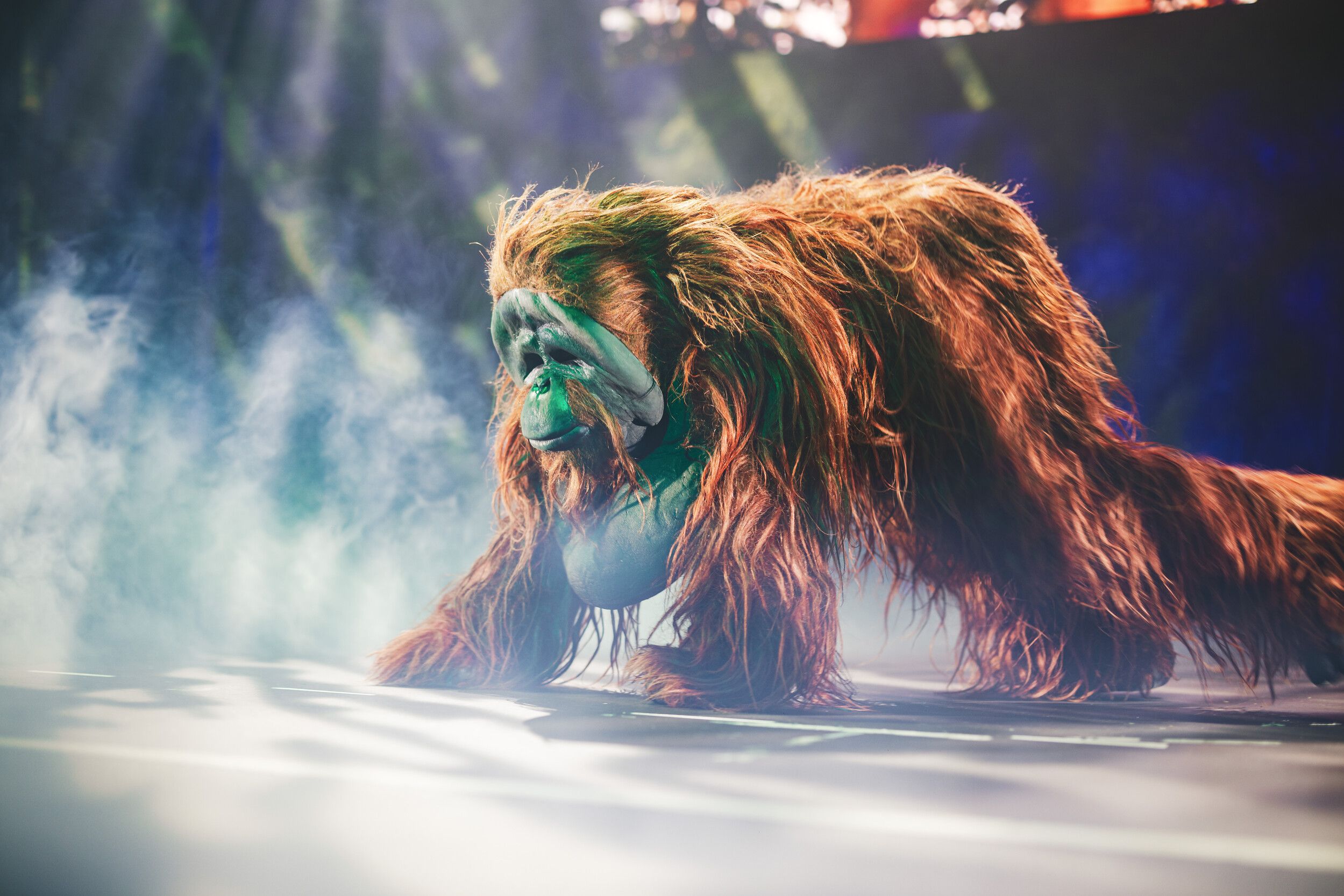 A life-size orangutan on stage.