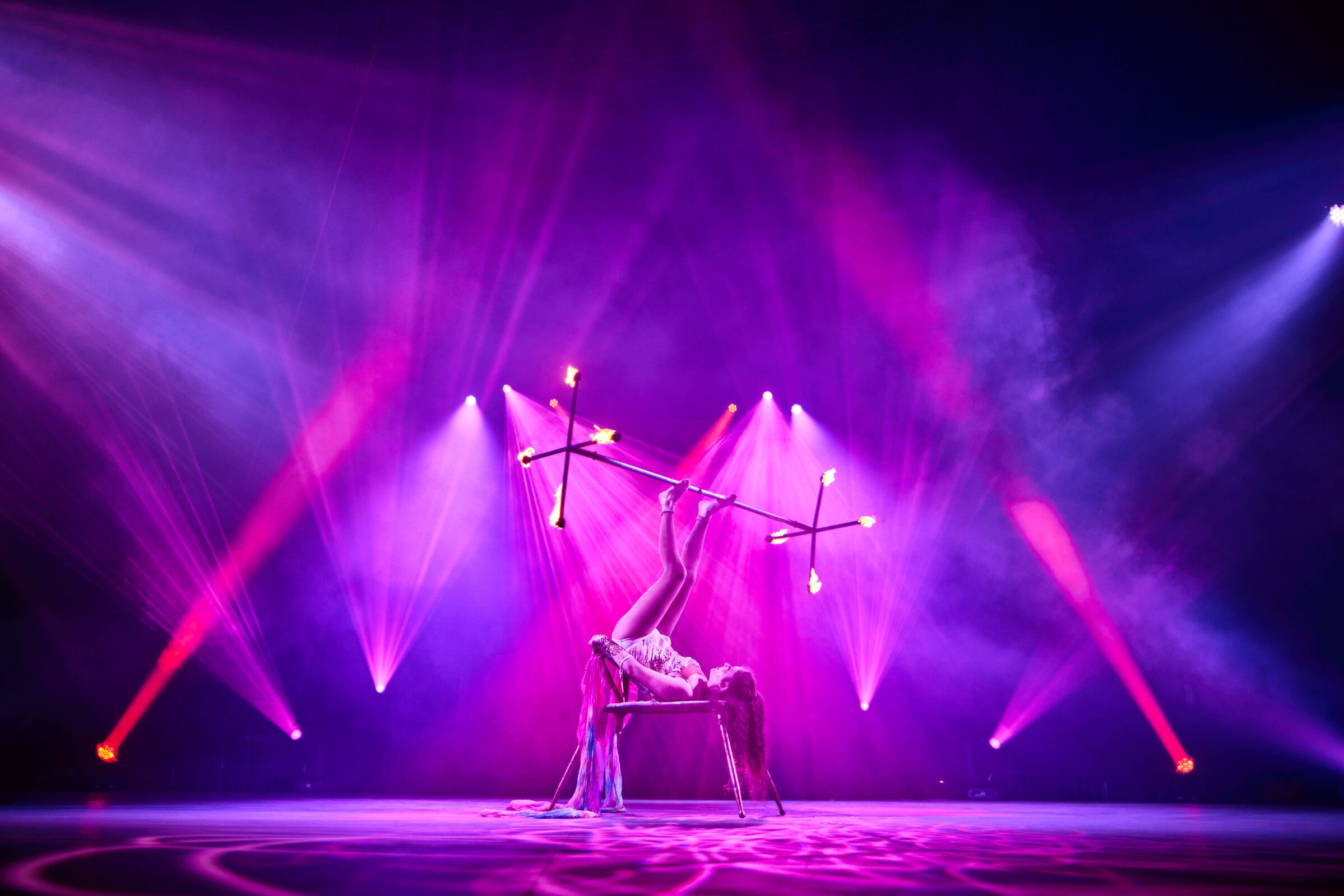 A fire performer on stage for the Big Top Circus show.