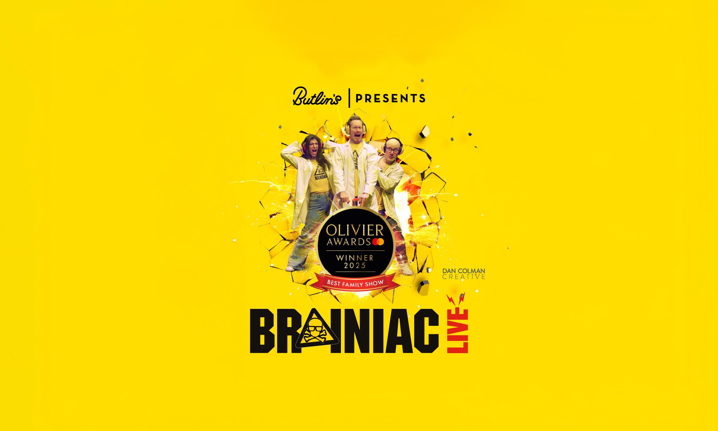 A promotional image for the Brainiac 2026 show. The image features a striking yellow background, with three people at the centre in Brainiac branded t-shirts, and lab coats. An explosion is behind them and the logo for the "Olivier Awards Winner 2025" is below them for Best Family Show. At the top of the image are the words "Butlin's presents" and at the bottom "Brainiac Live" in large, bold letters.