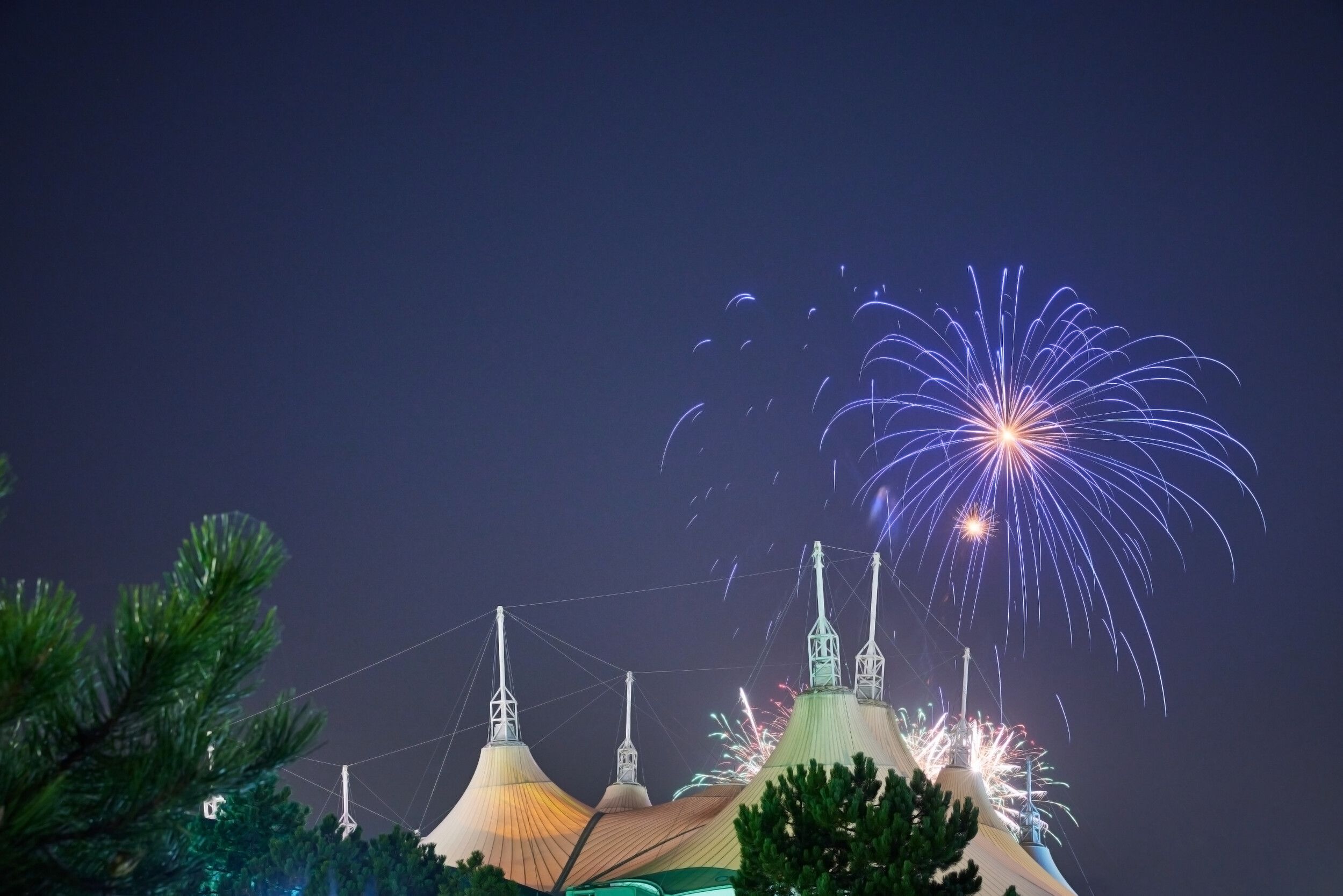 A view of the fireworks above Skyline Pavilion at night.