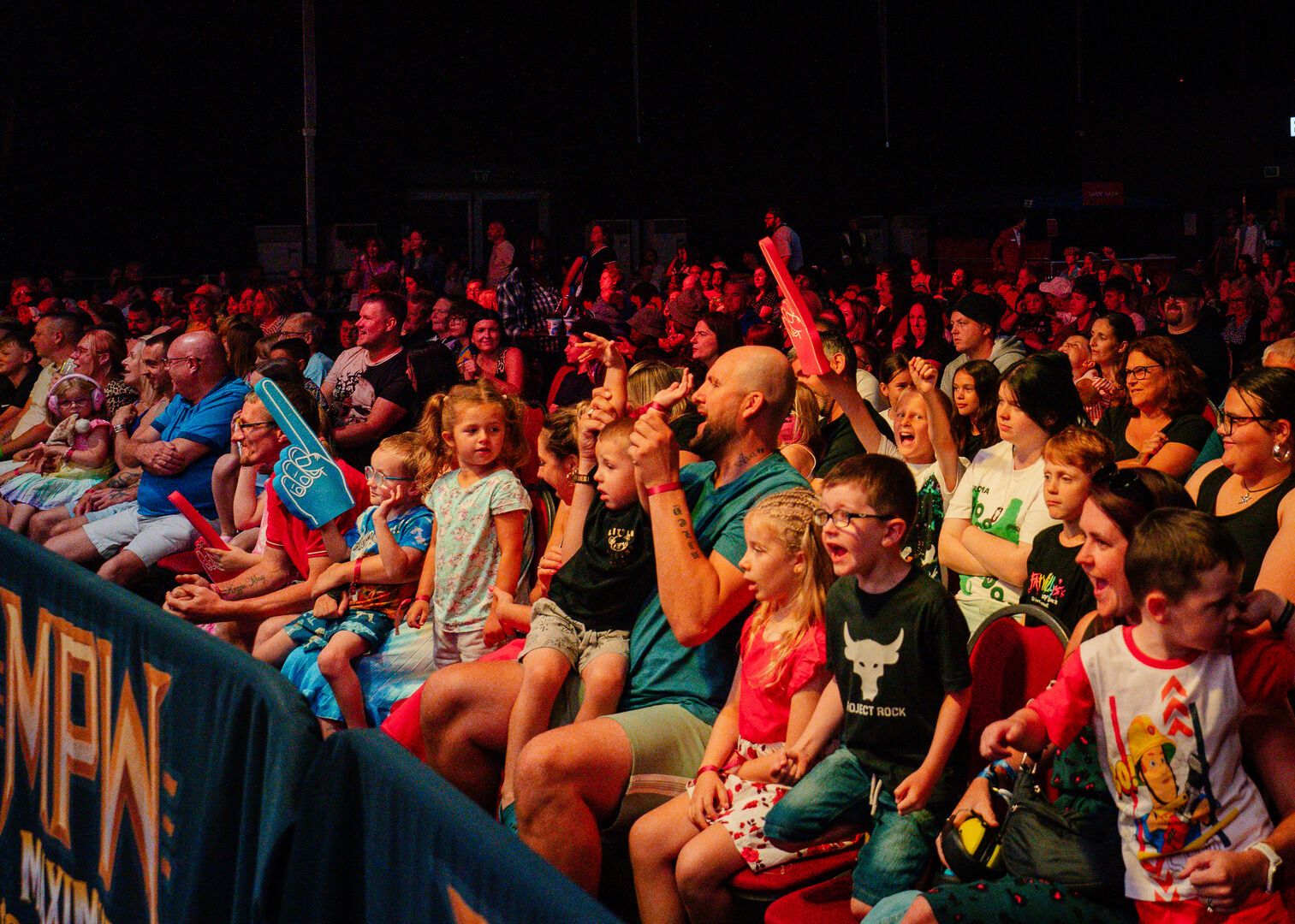 A close-up on the audience during a Maximum Pro Wrestling show at Butlin's.