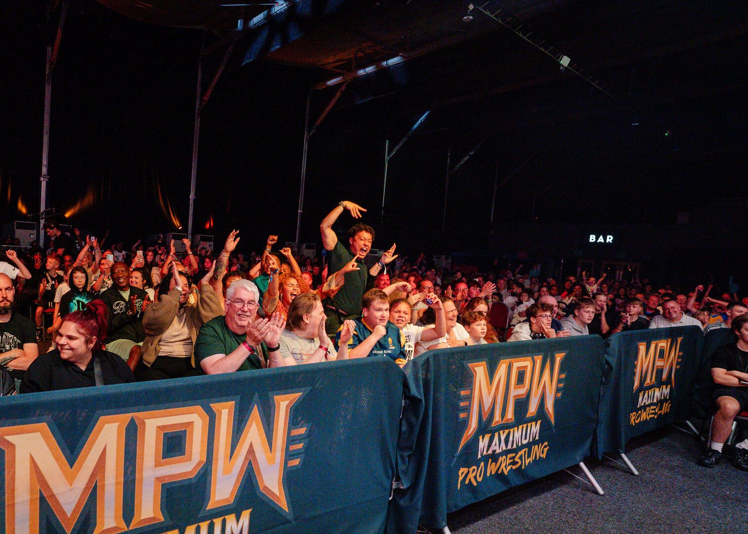 The audience excitedly watch the Maximum Pro Wrestling live show at Butlin's.