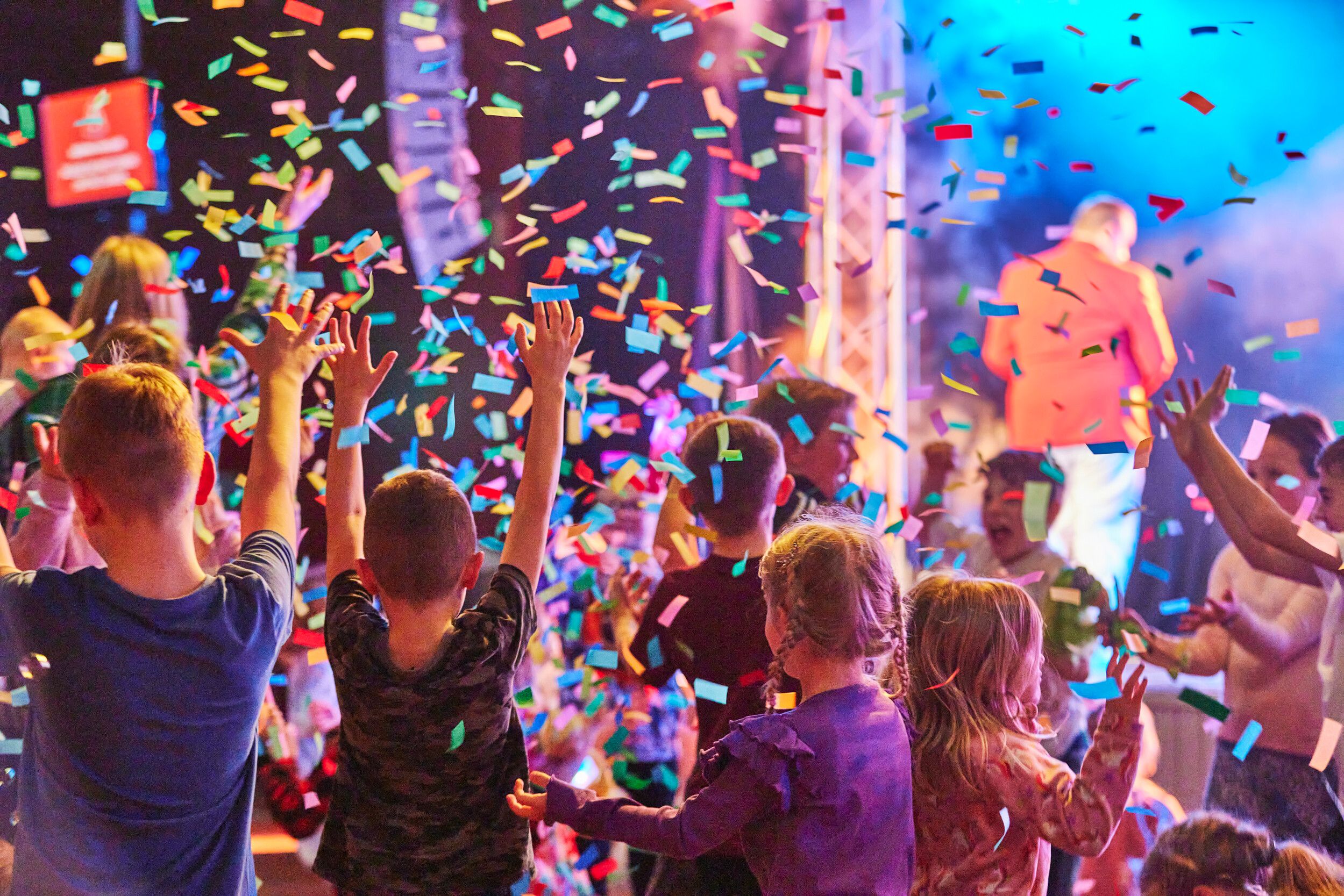Confetti falls on the audience as they watch the Night at Reds show.