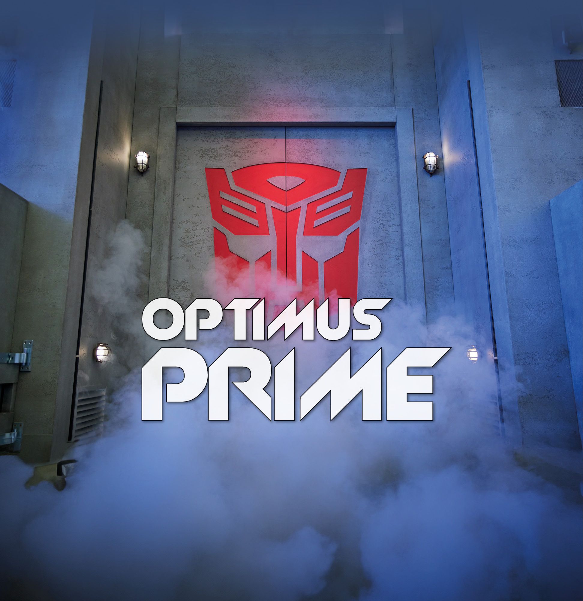A large grey door with smoke surrounding it. On the door, is the Transformers logo in red. With the words "Optimus Prime" overlaid on top.