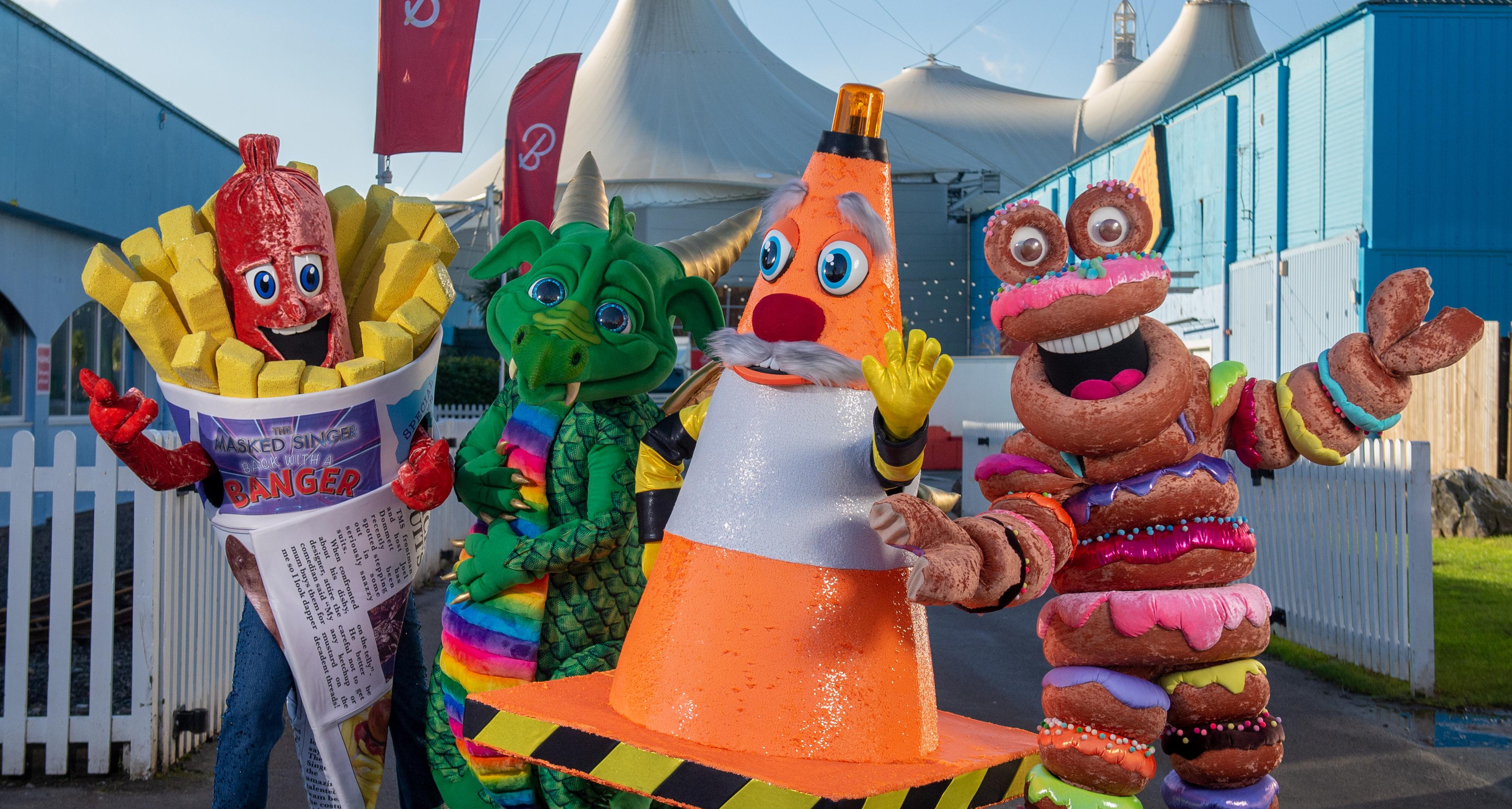 Sausage, Dragon, Traffic Cone and Doughnut pose for the camera while at Butlin's Minehead resort.